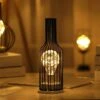 Lampada Da Notte In Ferro Retrò, Lampada Da Tavolo Creativa Con Bottiglia Di Vino, Lampada Da Notte In Filo Di Rame Per Hotel Ristorante Di Casa, Batterie Non Incluse -Negozio Di Illuminazione Per La Casa Alla Moda 52860003 1
